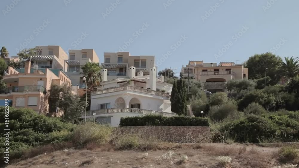 Houses on the slopes of hills, villas and mansions. Cala Mendia. Mallorca