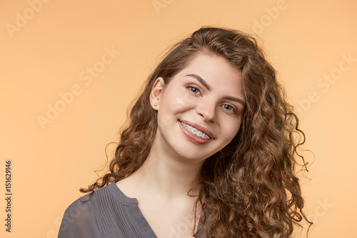 curly hair woman with brackets