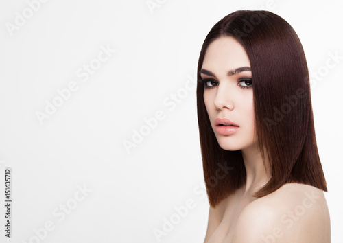 Beauty portrait model with shiny brown hairstyle