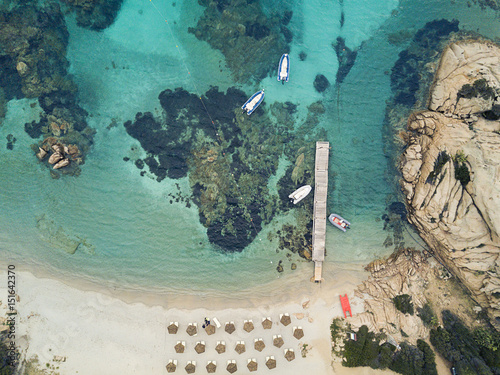 Fototapeta Naklejka Na Ścianę i Meble -  Aerial view of the Sardinian Emerald Coast, with its turquoise sea. Costa Smeralda in Sardinia Island, is one of the most beautiful and famous coasts in the world