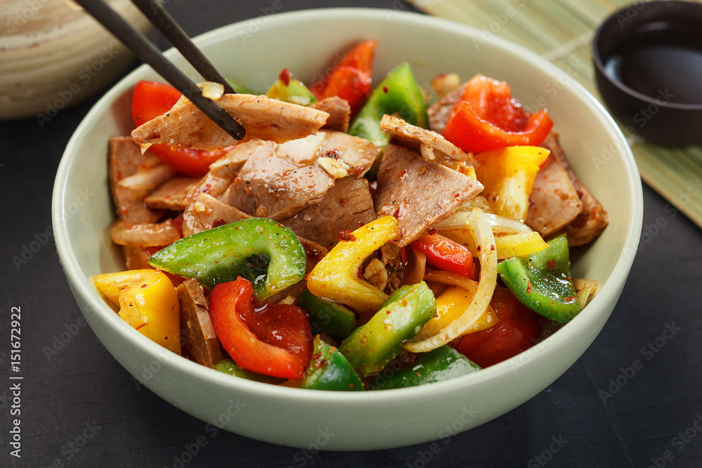 Asian food. Delicious salad with meat and pepper Asian food. Delicious salad with meat and pepper