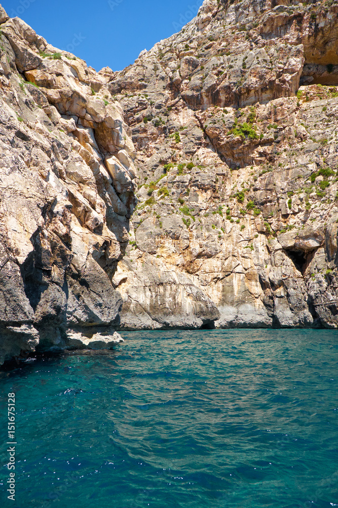 Steep cliff over Mediterranean sea on south part of Malta island
