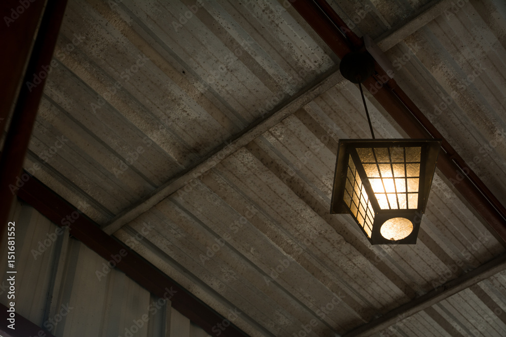 Obraz premium Lighting lamp under the ceiling