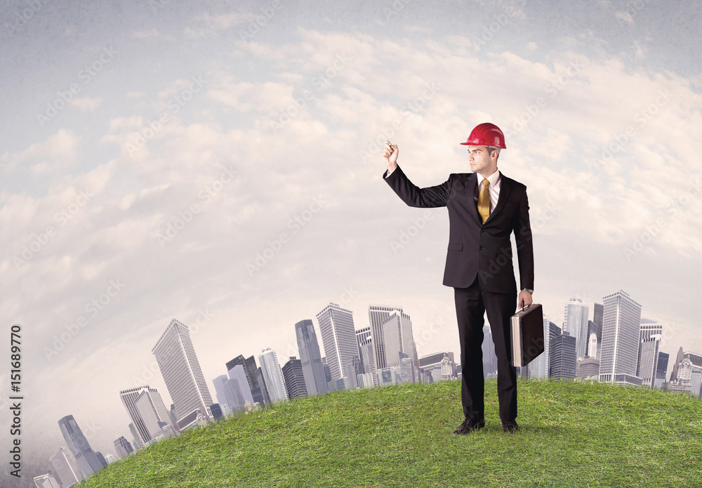 man standing in front of city landscape man standing in front of city landscape