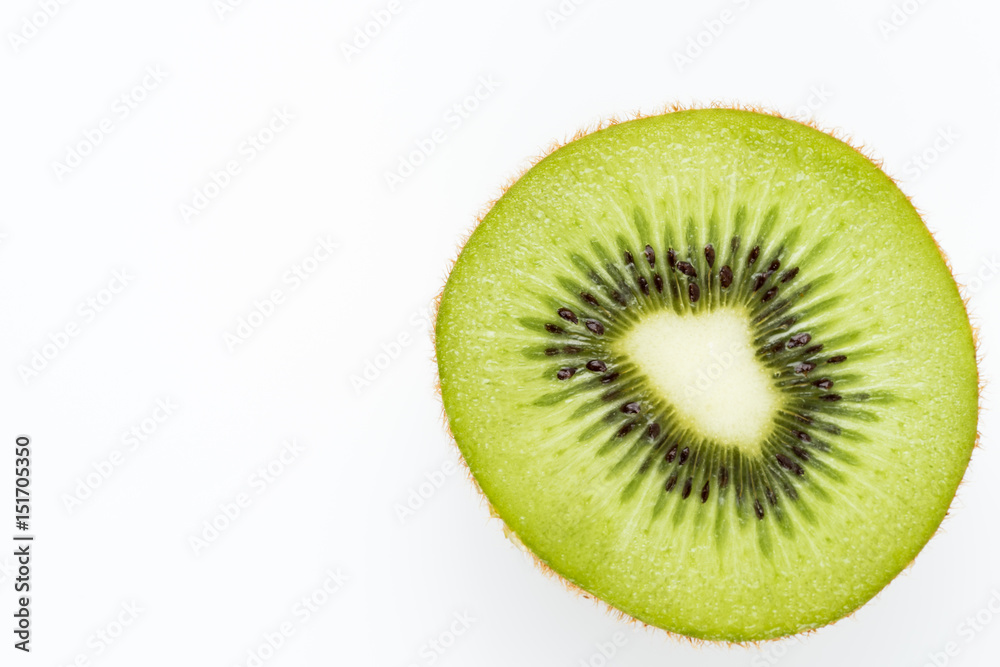 Close up of kiwi slice isolated over white background Close up of kiwi slice isolated over white background