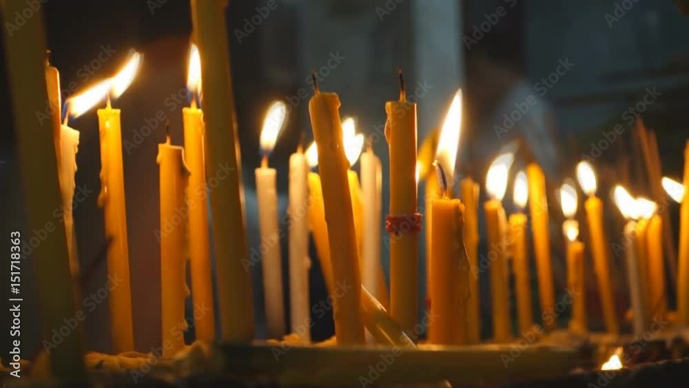 group of candle in buddha temple group of candle in buddha temple