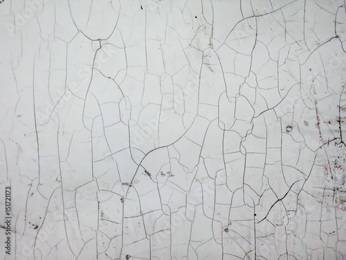 Abstract background from plastic with several cracked, old plastic plate with cracked surface, dirty and stain on surface level.