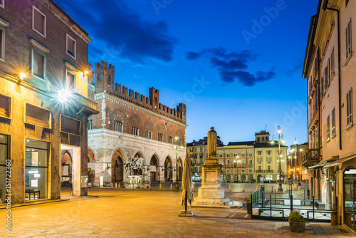 Piacenza, medieval town, Italy. Piazza Cavalli (Square horses) and palazzo Gotico (Gothic palace) in the city center on a beautiful day, at dusk. Emilia Romagna