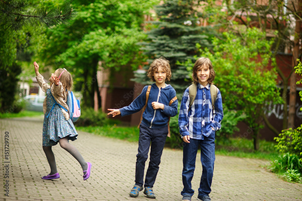 Three little friends hurry on lessons in school. Three little friends hurry on lessons in school.