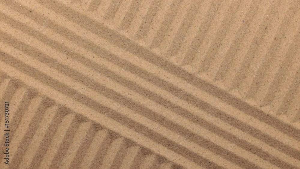 Rotation of lines made of sand. View from above Rotation of lines made of sand. View from above