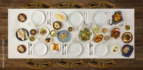 Traditional dishes on the big wooden table