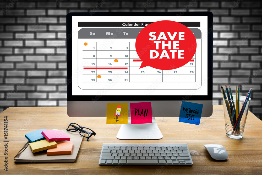 SAVE THE DATE message on a calendar SAVE THE DATE message on a calendar