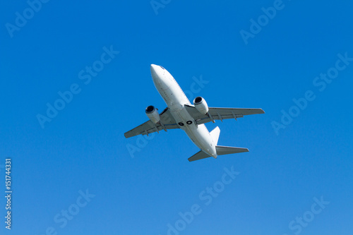  flying airplane on a clear sunny day