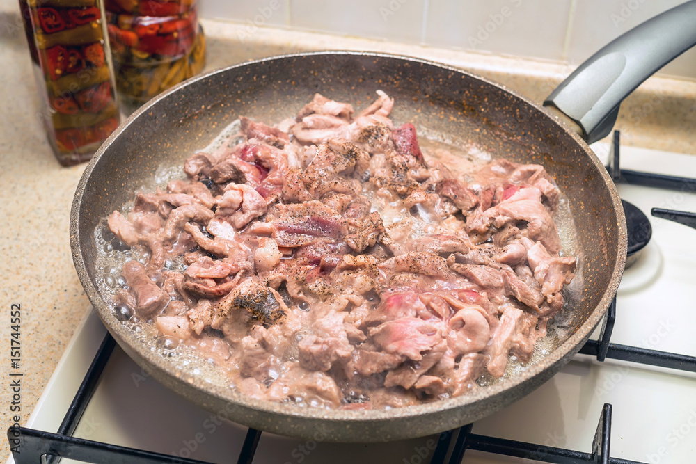 Meat roasted on frying pan Meat roasted on frying pan