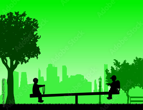 The boys are bouncing on the children's playground on the teeter,one in the series of similar images silhouette