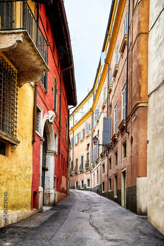 Narrow mountain town street in Verona