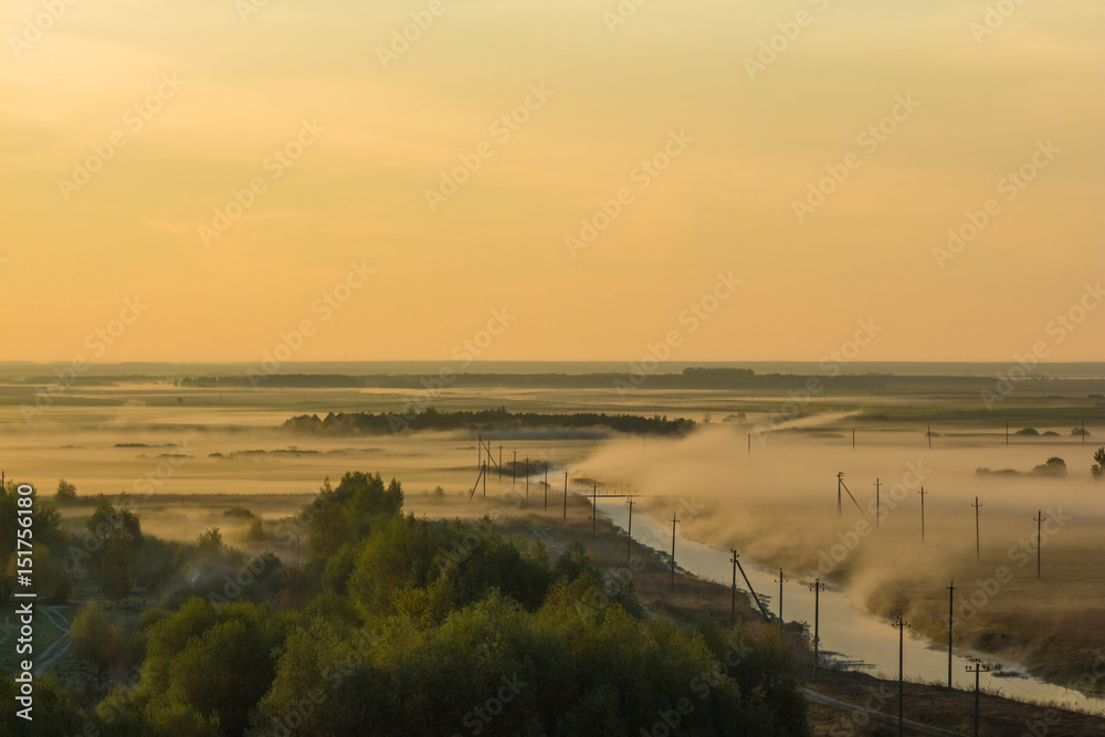 Beautiful scenery with river and fog