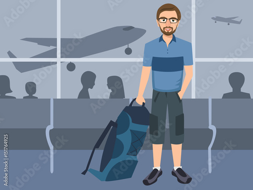 man with backpack at airport