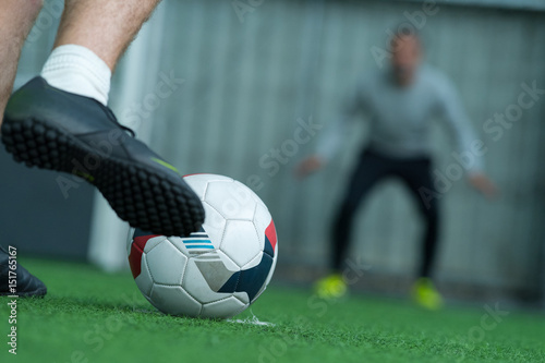 soccer player ready to shoot penalty