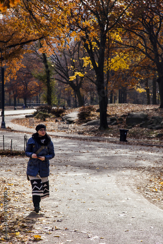 Woman on Central Park Path in Autumn