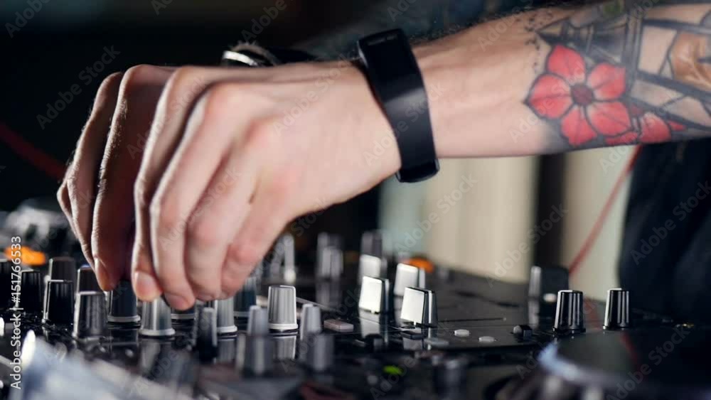 Creating of the music by unrecognised DJ. Close-up. HD. Creating of the music by unrecognised DJ. Close-up. HD.