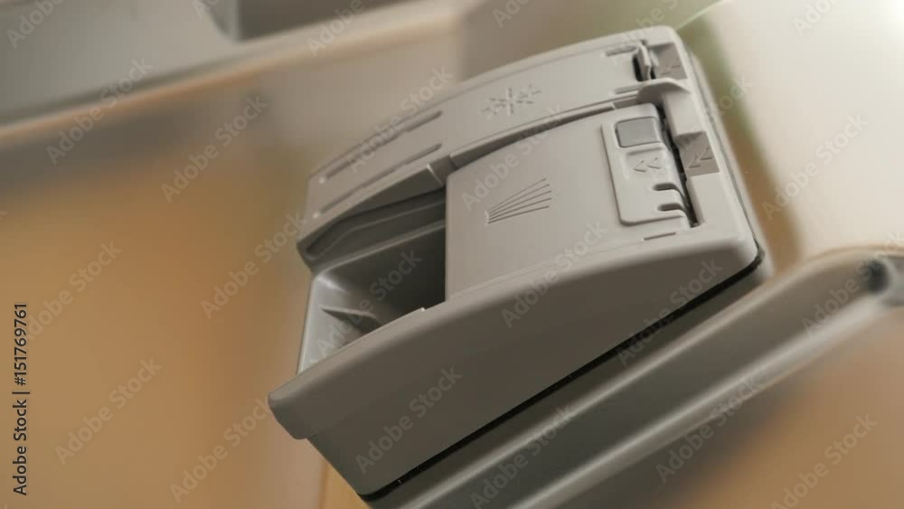Dishware and cutlery washing machine detergent tray 4K 2160p 30fps UltraHD footage - Dishwasher tablet automatic compartment 3840X2160 UHD tilting video Dishware and cutlery washing machine detergent tray 4K 2160p 30fps UltraHD footage - Dishwasher tablet automatic compartment 3840X2160 UHD tilting video
