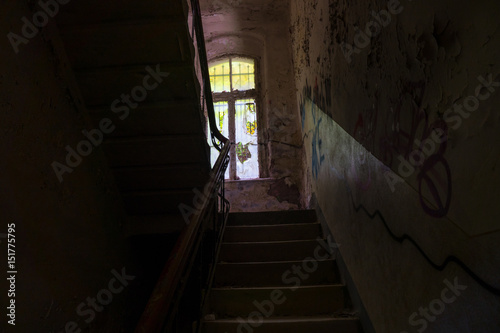 The old staircase in abandoned ruined building, lost places