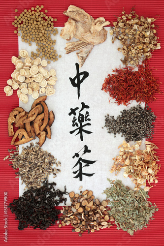 Chinese herb tea collection with calligraphy on rice paper, teas also used in alternative medicine. Translation reads as chinese herb tea.   photo