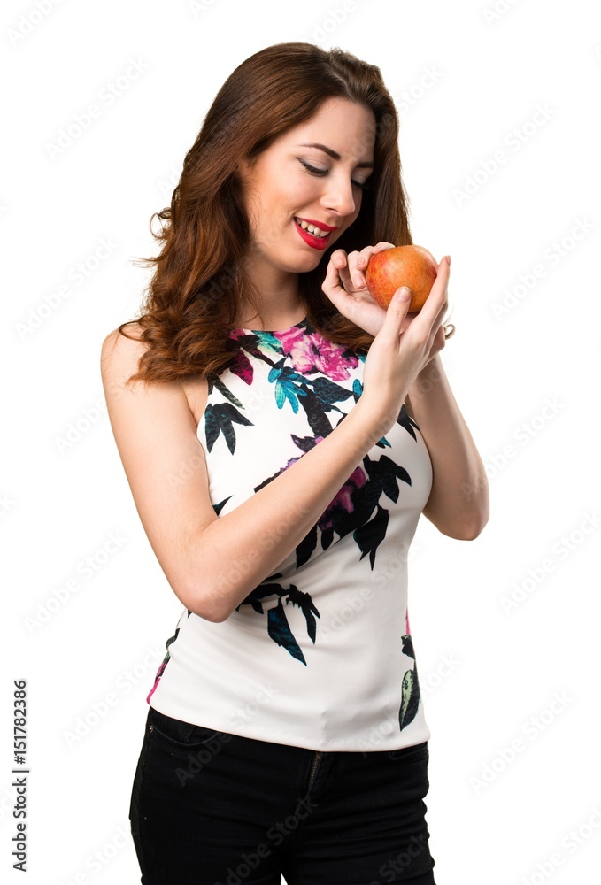 Happy beautiful young girl with an apple Happy beautiful young girl with an apple