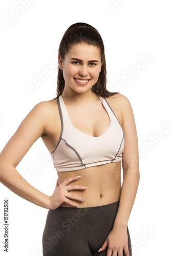 Beautiful smiling happy slim young sporty fitness woman