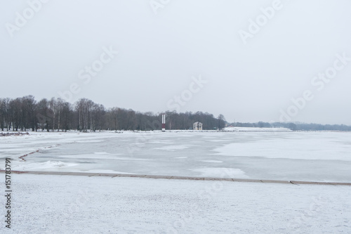 Frosty sea in winter, full of snow.