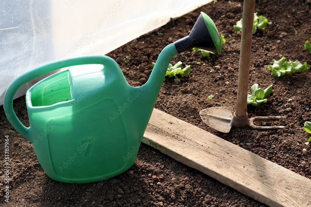 Gardening tool in a sustainable greenhouse in countryside Gardening tool in a sustainable greenhouse in countryside