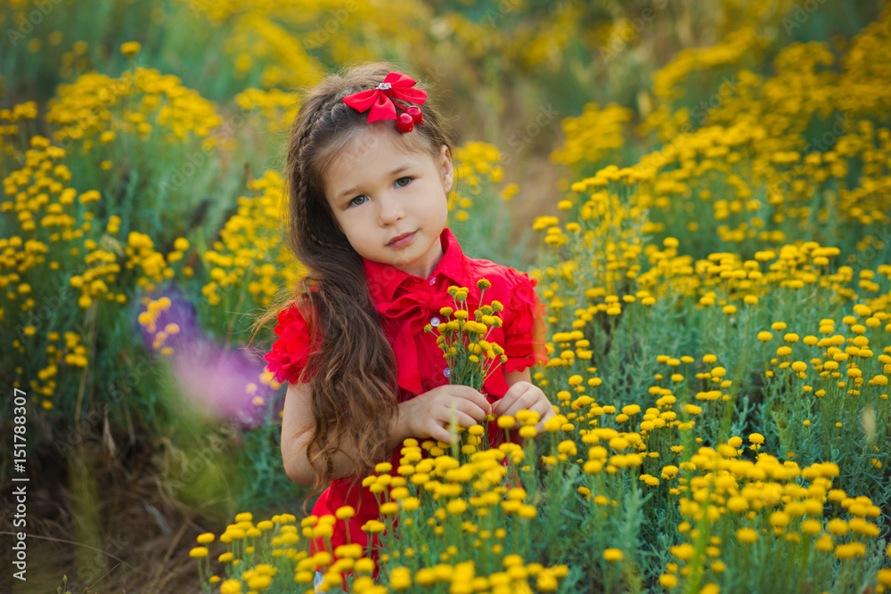 Young cute girl in red shirt and white 
