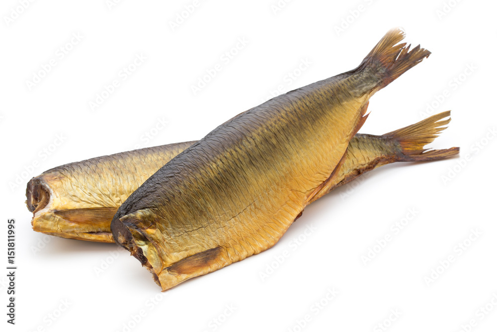 Smoked trout in front of a white background.