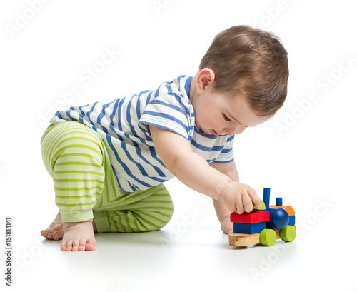 little boy kid playing with...