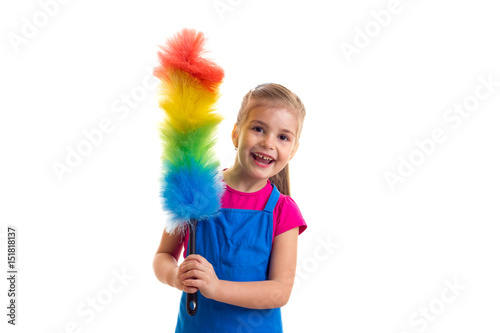 Girl in apron with duster
