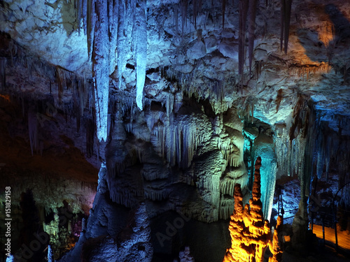 Geological formation underground. Stalactite cave.
