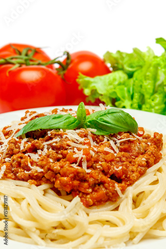 Spaghetti bolognese on a white plate