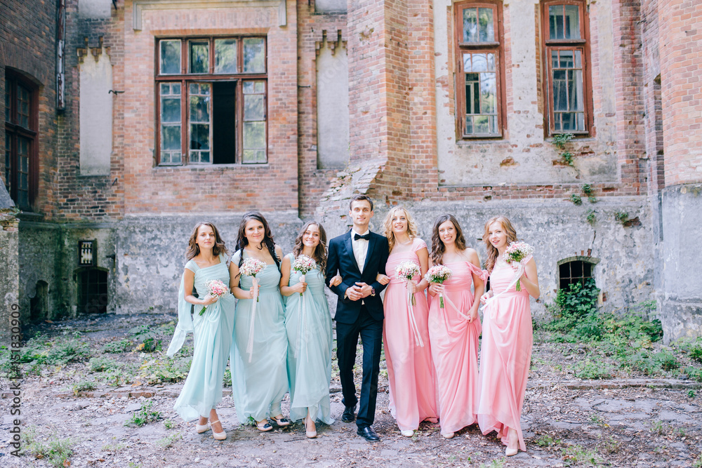 Groom with pretty bridesmaids