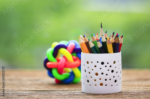 Stock Photo - Color pencils in the box on the table