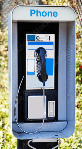 Vintage payphone. Vertical.