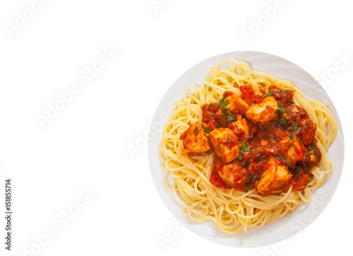 chicken breast in tomato sauce with spaghetti. top view. isolated on white