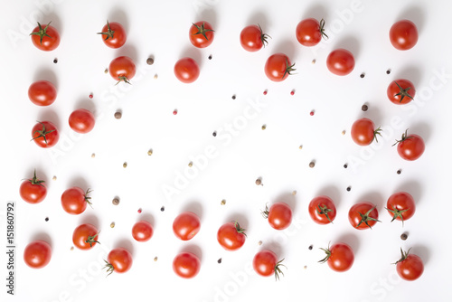 flat lay of framed beautiful trendy seamless pattern cherry tomato and dry peppers, close up