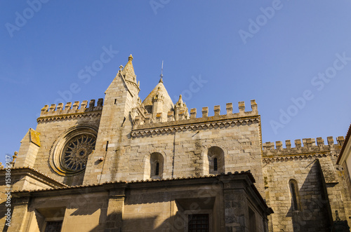 Se Cathedral, lateral view of the Se cathedral in Evora, Unesco heritage site. portugal. © marinzolich