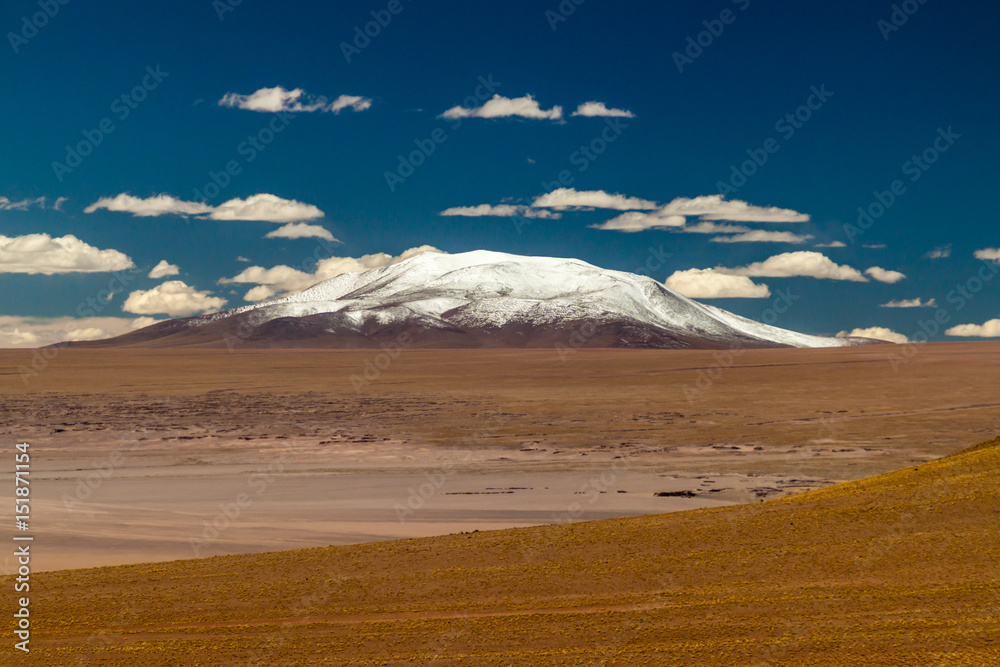 Snow covered peak at bolivian Altiplano