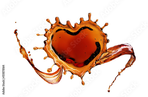 Heart from cola splash with bubbles isolated on white