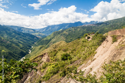 Dense jungle in Yungas mountains, Bolivia. Town Coroico on th right side.