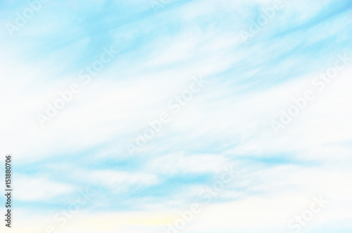 The turquoise sky with clouds. Background beautiful sky with gentle clouds.