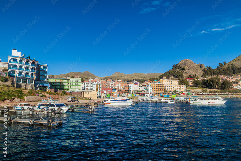 COPACABANA, BOLIVIA - MAY 12, 2015: Boats in a harbor of Copacabana town on Titicaca lake, Bolivia