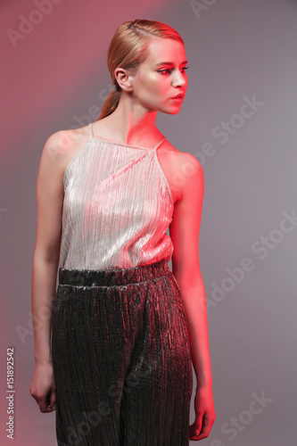 Beautiful young woman on co...